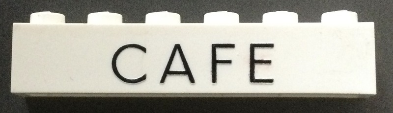Brick 1 x 6 without Bottom Tubes with Cross Supports with Black 'CAFE' Thin Letters Pattern