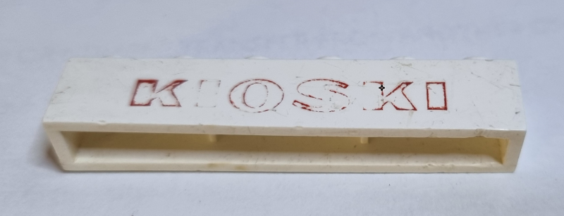 Brick 1 x 6 without Bottom Tubes with Cross Side Supports with Red 'KIOSKI' Bold Pattern
