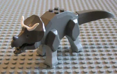 Dinosaur Triceratops with Light Gray Legs and White Horns