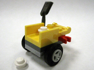 Advent Calendar 2009, City (Day 17) - Wheelbarrow and Snowballs