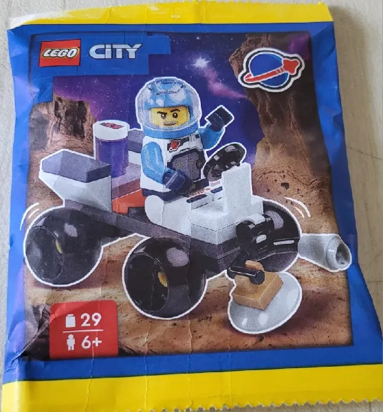 Astronaut with Quad paper bag